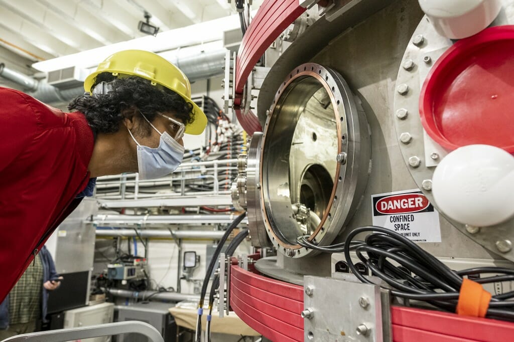 Nasser gets a closer look at the Pegasus-III tokamak device, which allows for fusion research.