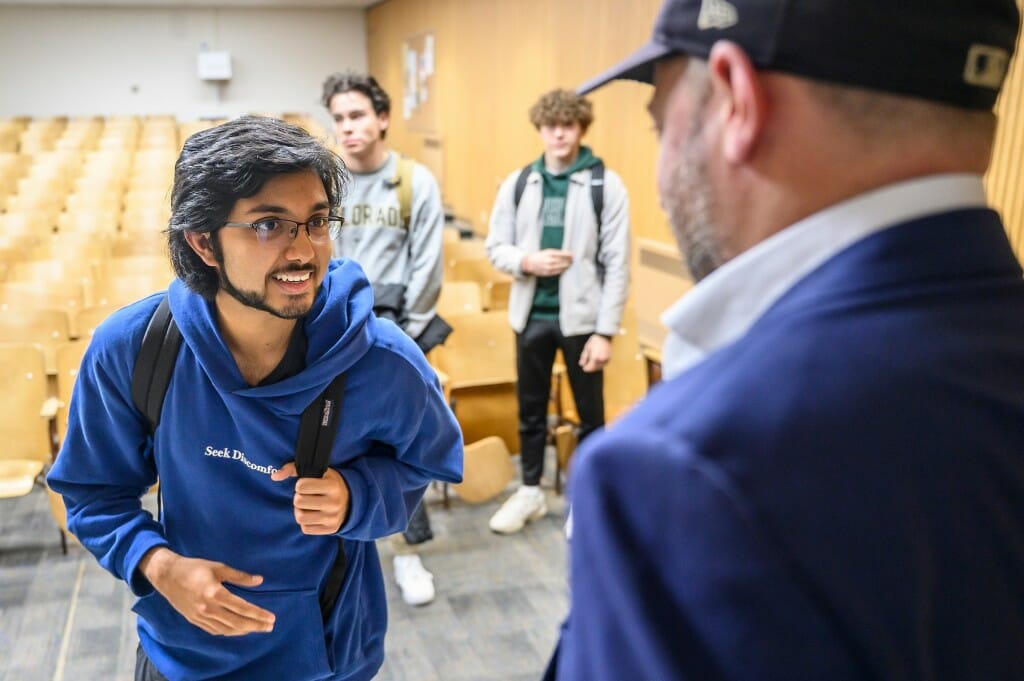 Kaushal Dasika asks a question to Nate Silver in a Russle Laboratories classroom.