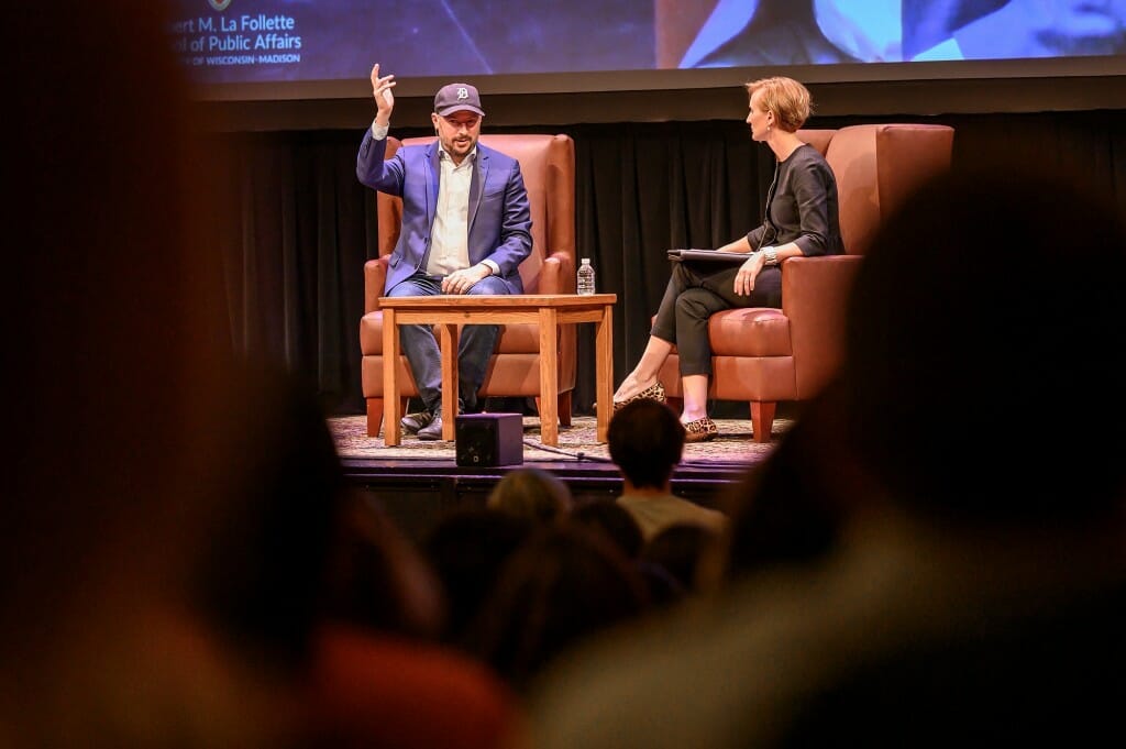 At left, Nate Silver, Public Affairs Journalist in Residence and founder and editor in chief of FiveThirtyEight, gestures as he answers audience questions posed to him by Susan Webb Yackee (at right), director of the La Follette School of Public Affairs, in Shannon Hall in the Wisconsin Union Theater