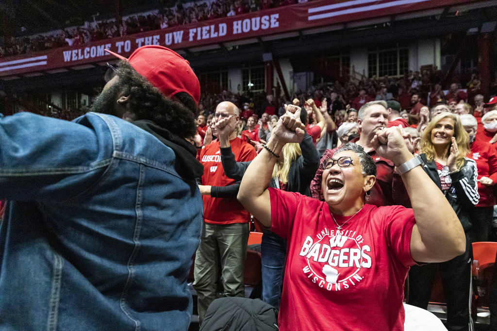 Fans celebrate after the Badgers score a point on Saturday at the Field House.