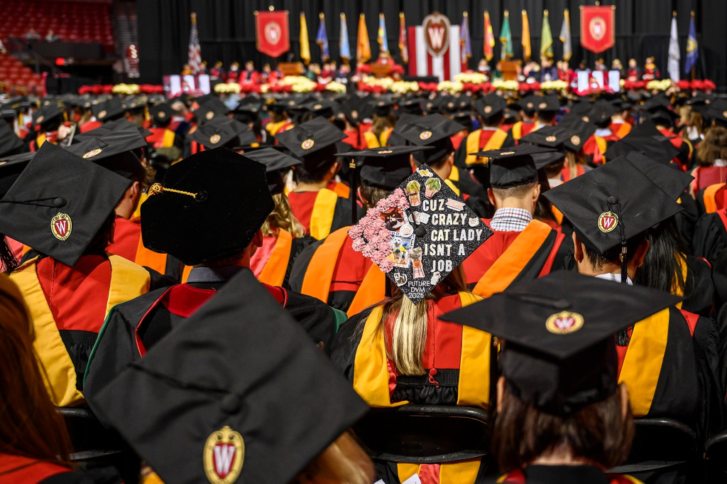 Graduates express their joy and gratitude — and motivations — through their mortarboard decorations.