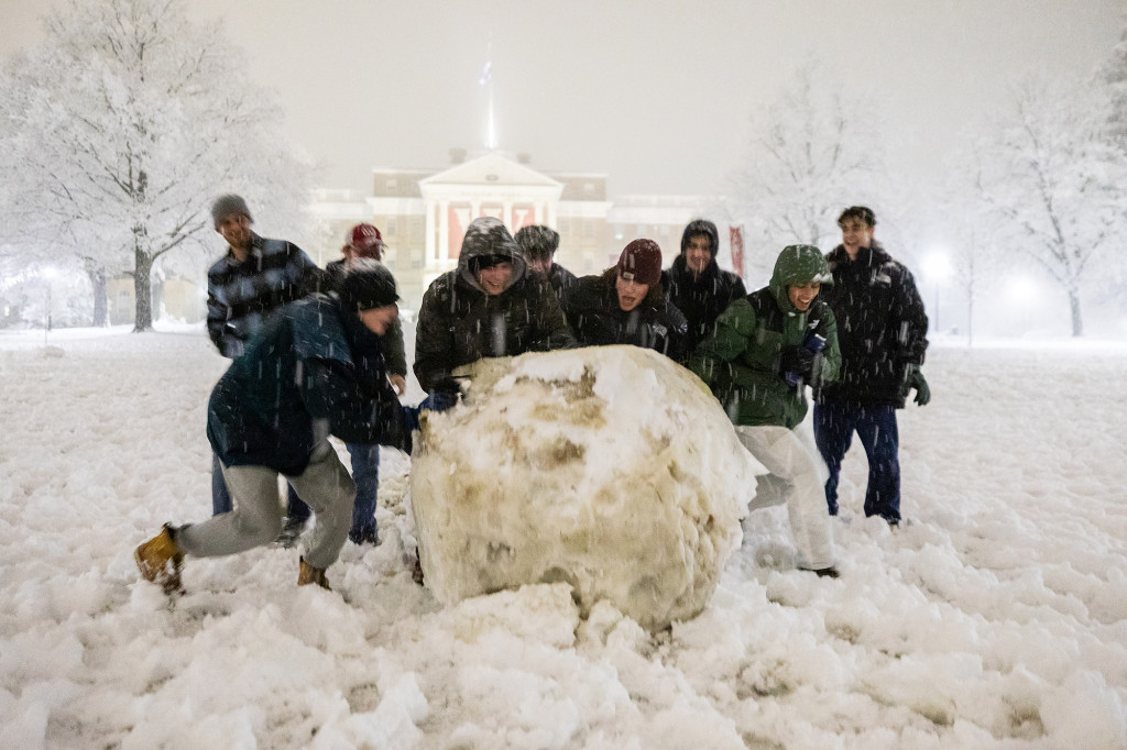 It took a team to push this large snowboulder down the hill.