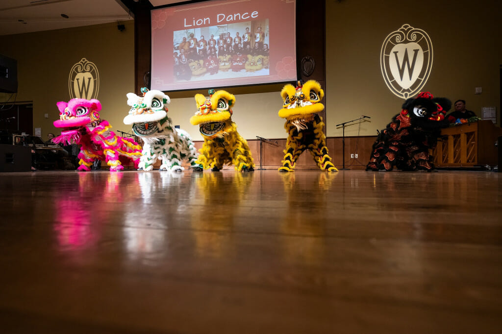 Members of the Zhong Yi Kung Fu Association (of Madison) perform a lion dance at Varsity Hall.