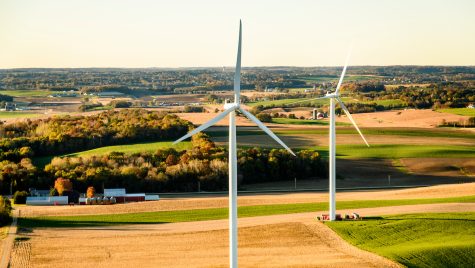 Windmill turbines in rural Wisconsin farm land northeast of Madison near Baraboo are pictured in an early morning aerial taken from a helicopter on Oct. 23, 2018. (Photo by Bryce Richter /UW-Madison)