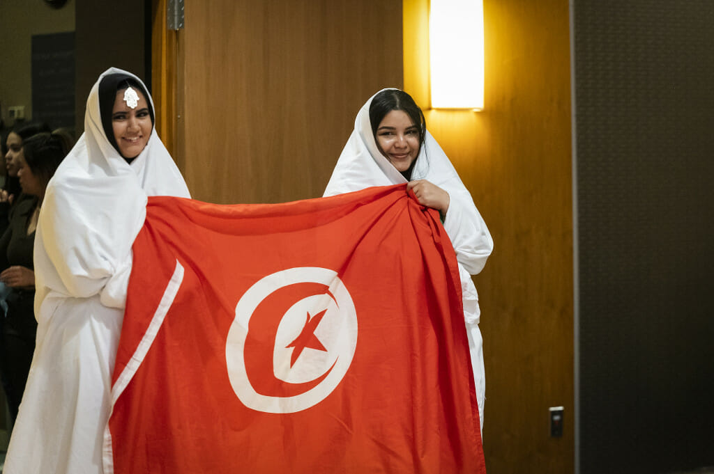 Students Azza Bayoudh (left) and Cyrine Jdidi (right), both wore clothing from Tunisia.