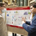 UW–Madison senior Maxwell Unger, right, talks about his research project done with Mario Cribari, called 