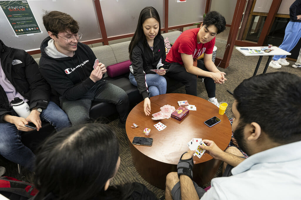Students enjoy an impromptu card game.
