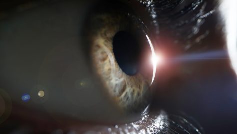 Female eye on surgery clinic exam closeup