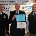 ESGR State Chairman and Brigadier General (retired) Scott Legwold presents the Above and Beyond Award to the University of Wisconsin–Madison. Chief Technology Officer Todd Shechter accepted the award on behalf of UW.
