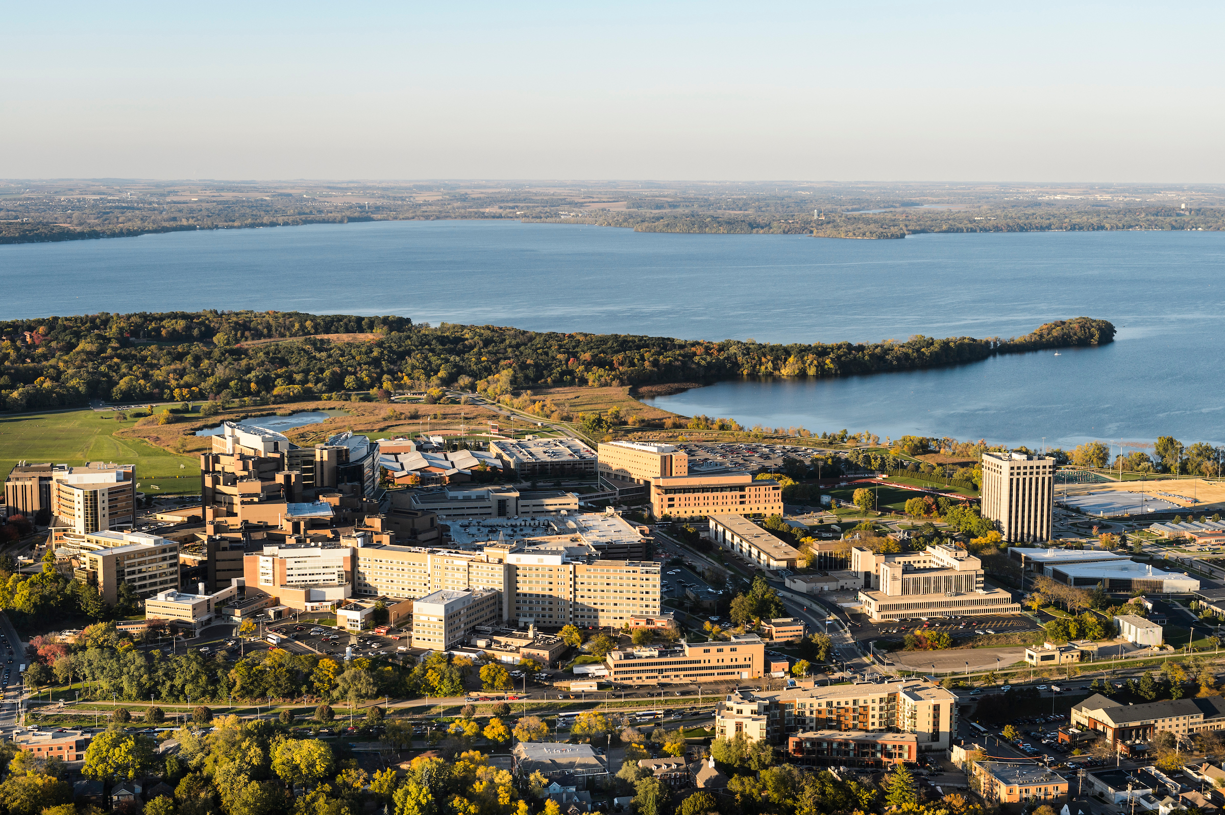 The far western portion of the University of Wisconsin–Madison campus, which includes the medical complex featuring UW Hospitals and Clinics, Picnic Point and Lake Mendota, are pictured in an aerial view during autumn on Oct. 13, 2016. The photograph was made from a helicopter looking west. 