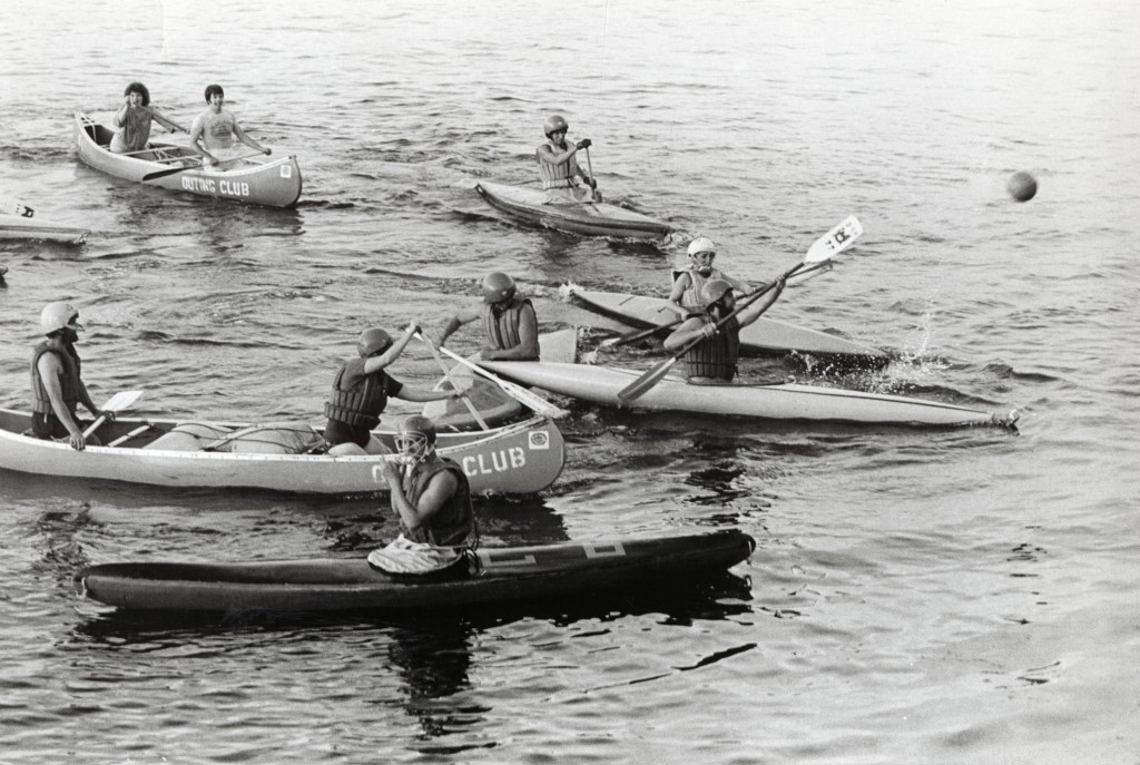 An old photo of students canoeing and kayaking.