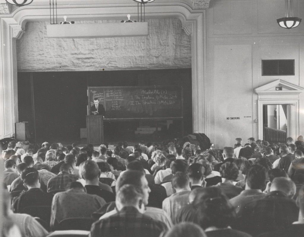 A black and white photo of students in class.