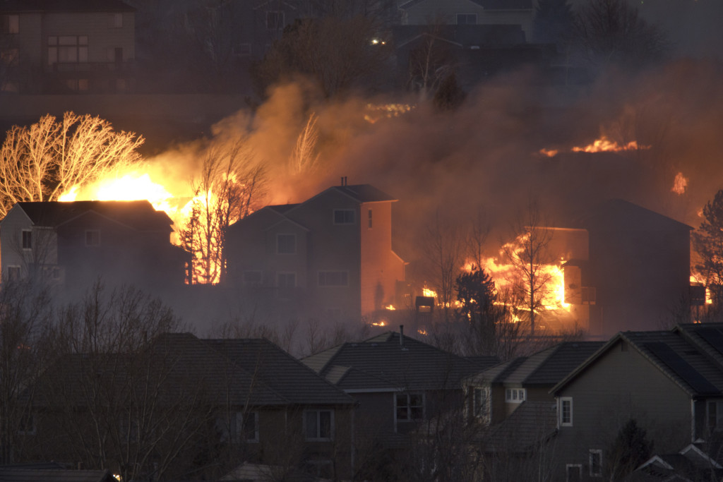 A fire burns several homes.