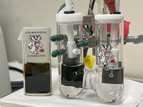 Some beakers on a counter.