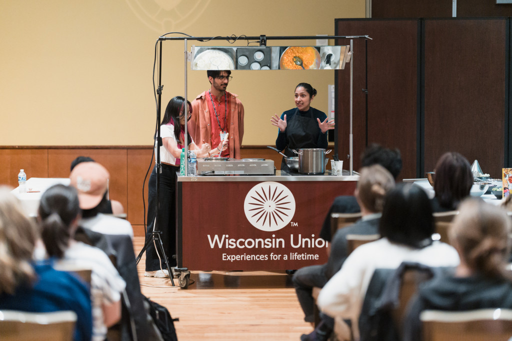 The keynote event included a cooking demonstration from Krishna and a moderated Q&A. Above, Krishna is joined by Elaine Pajanustan (APIDA Heritage Month Planning Committee Chair) and Rohan Waghray (WUD Cuisine Director) as they make Pav Bhaji.  