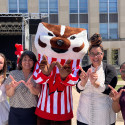 USMP staff pose with Bucky on Library Mall at the summer 2023 Chancellor's picnic