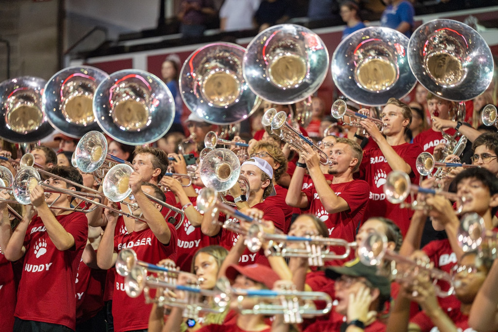 A picture of band members playing their instruments.