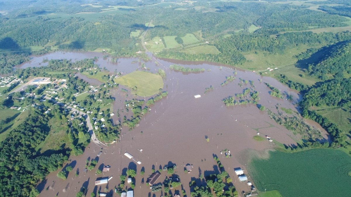Aerial photo of flooded homes and farm buildings