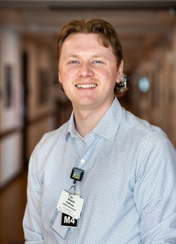 Hoffman Shane smiles for a photo portrait