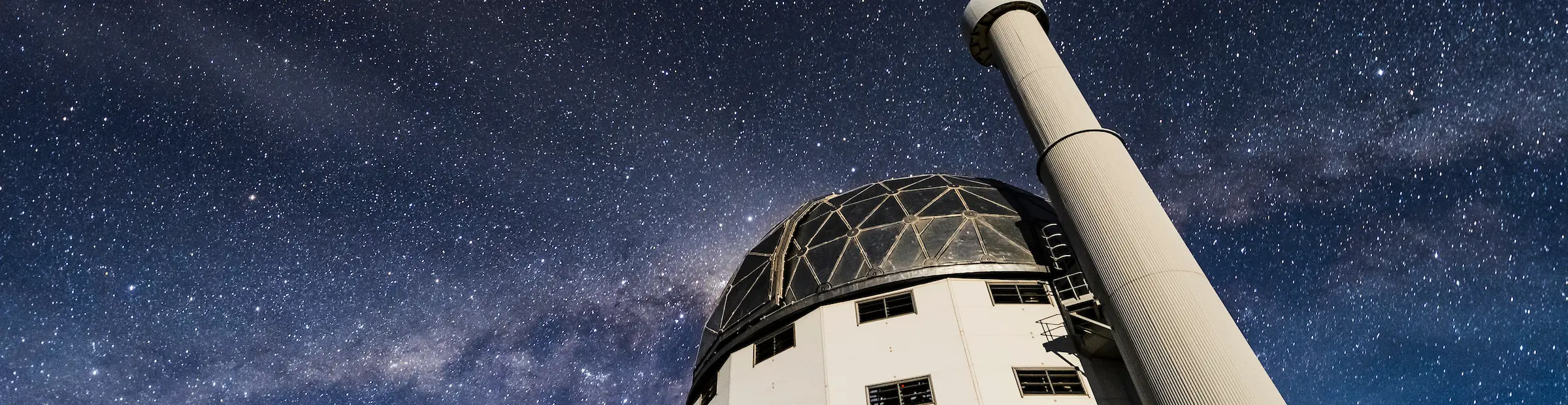 The Southern African Large Telescope under a starry sky with a visible Milky Way
