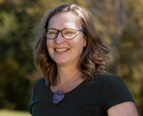 A portrait photo of Andrea Dutton.