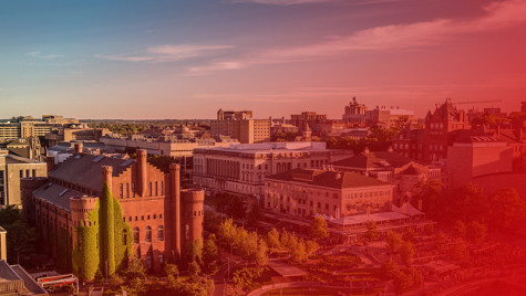 Aerial photo of the Red Gym, Memorial Union and the Lake Mendota shoreline with a transparent red gradient overlaid on the image