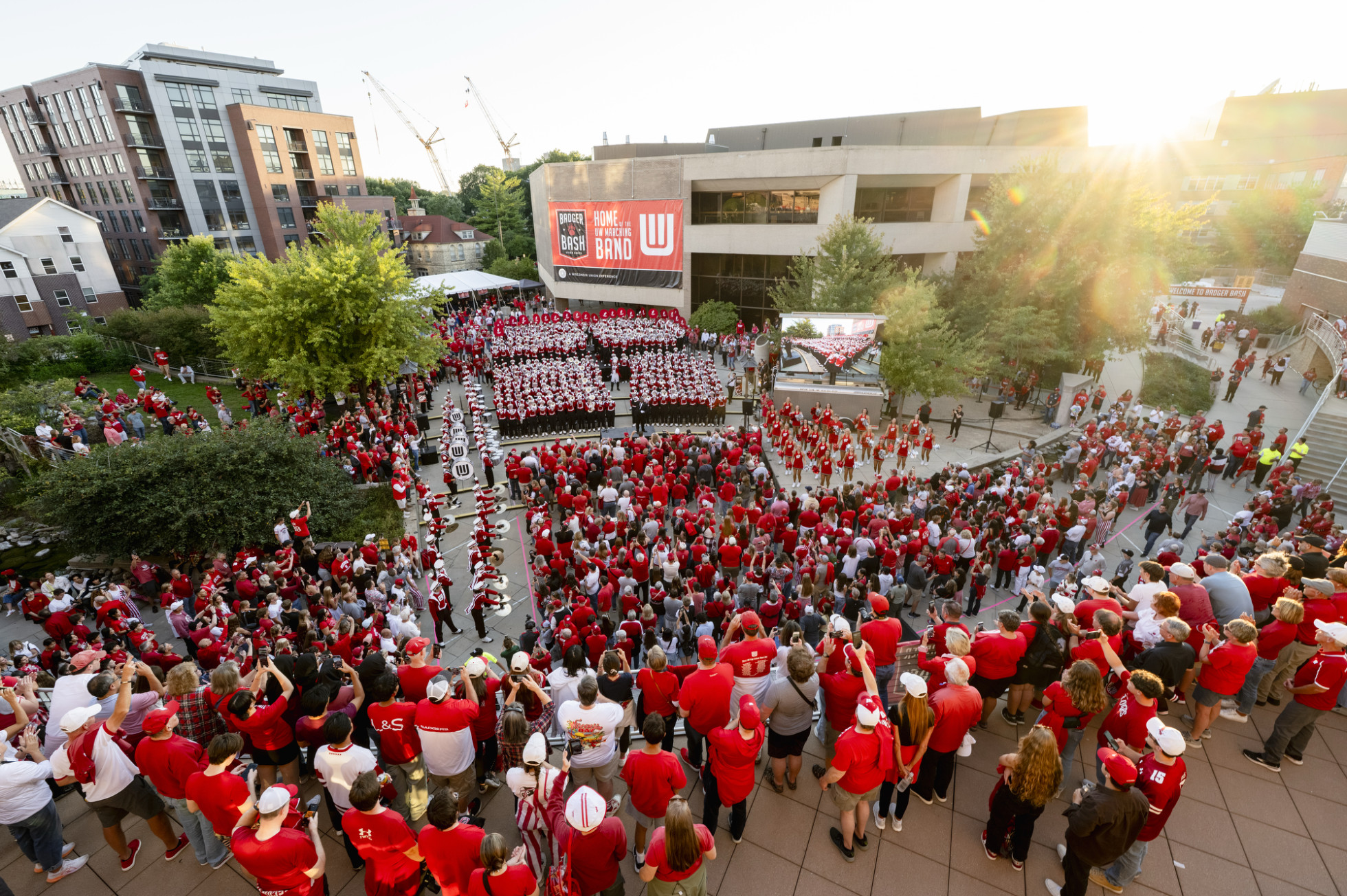 An overview of Badger Bash at Union South, with the UW Marching Band playing in front of dozens of fans.  