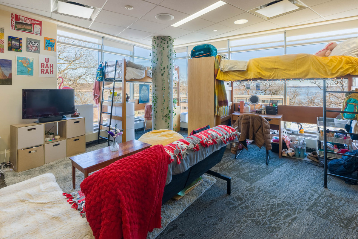 A nicely decorated dorm room is shown.