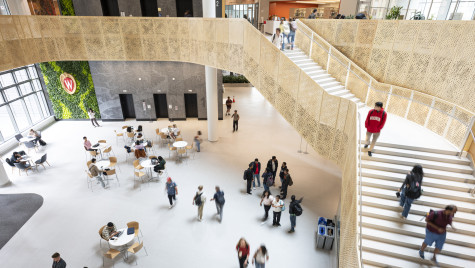 Students gather in the lobby of Morgridge Hall.