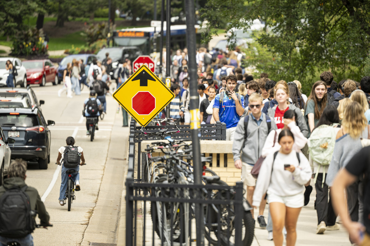 A view of students walking to and from class on North Charter Street. 