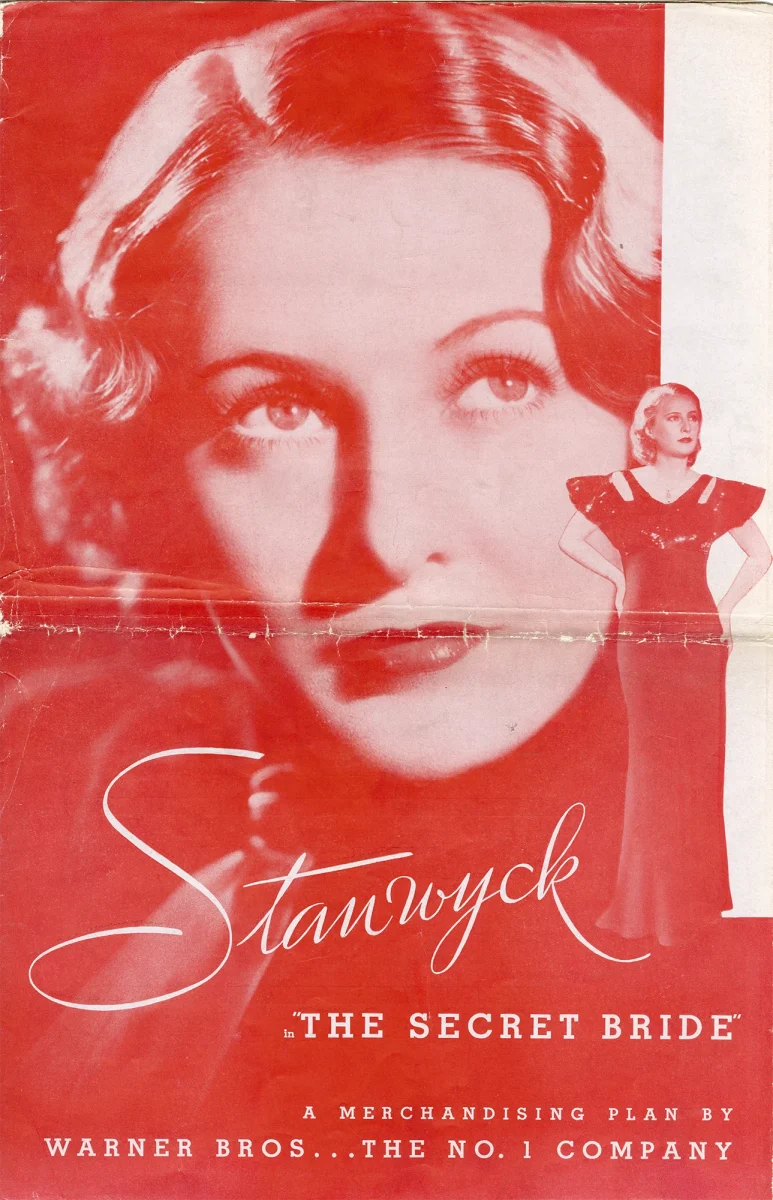 Vintage movie poster for 'The Secret Bride' featuring Barbara Stanwyck, with a red-tinted portrait of her face, a smaller full-body image in a dark dress, and promotional text from Warner Bros.