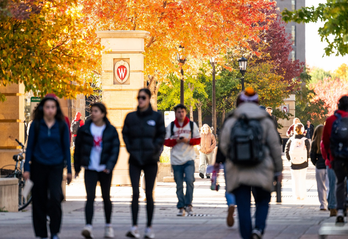 People walking through campus