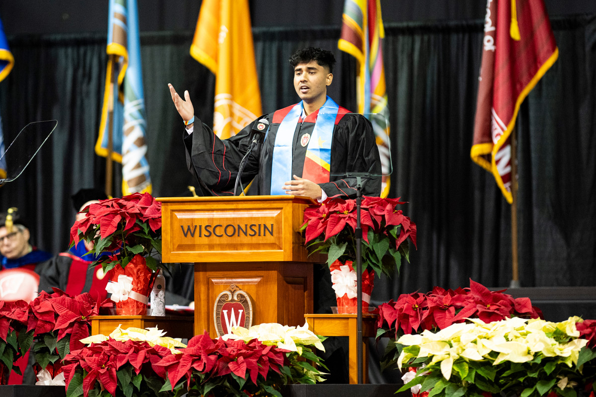 Student speaker Jeeva Premkumar addresses the crowd from the podium.
