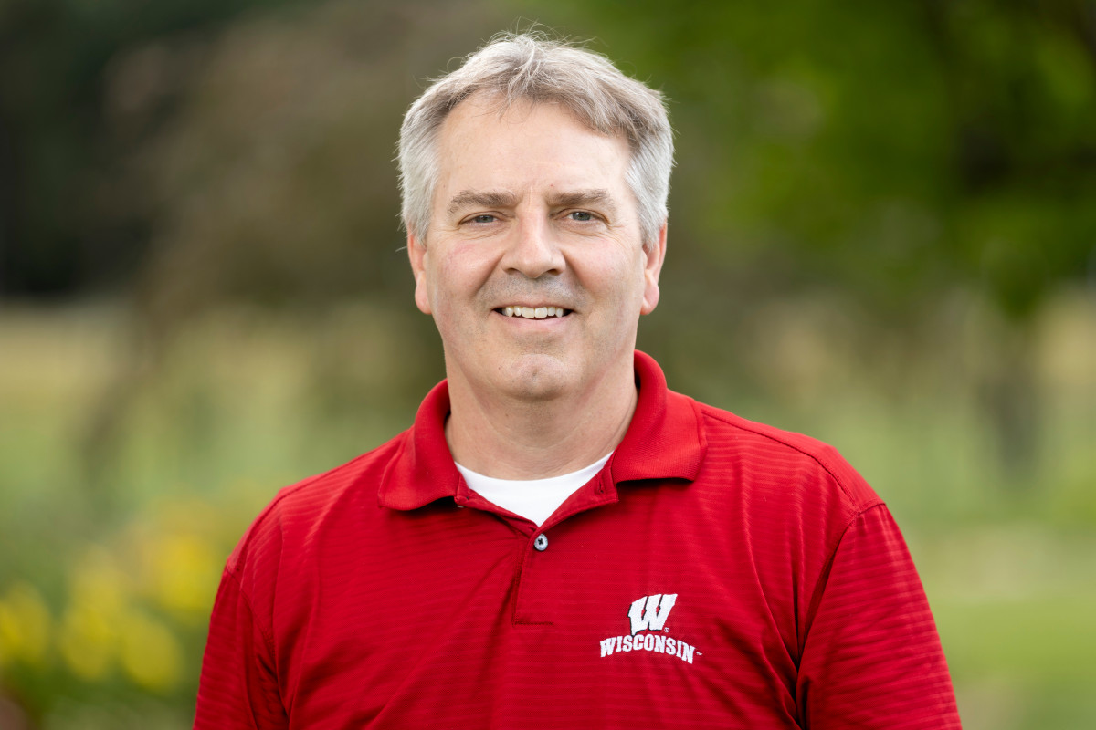 Troy Runge, new interim dean of CALS, wearing a red polo shirt