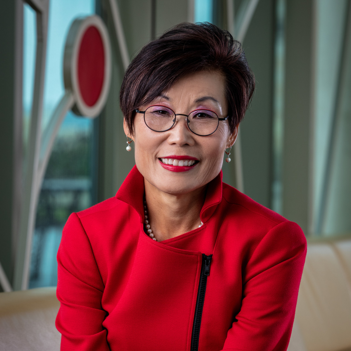 Portrait of Soyeon Shim wearing a red jacket