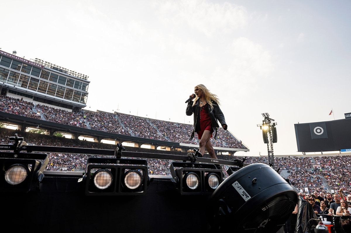 Frontwoman Taylor Momsen, with the band The Pretty Reckless, performs on stage at Camp Randall in front of a crowd of 50,000