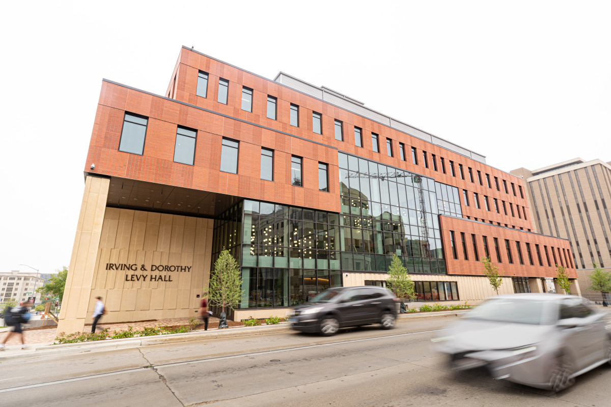 The exterior facade of Levy Hall shown from street view.