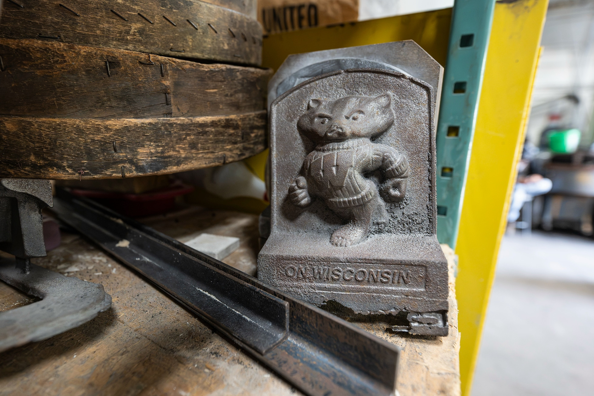 An image of Bucky Badger and the words On Wisconsin appear in a cast aluminum plaque.