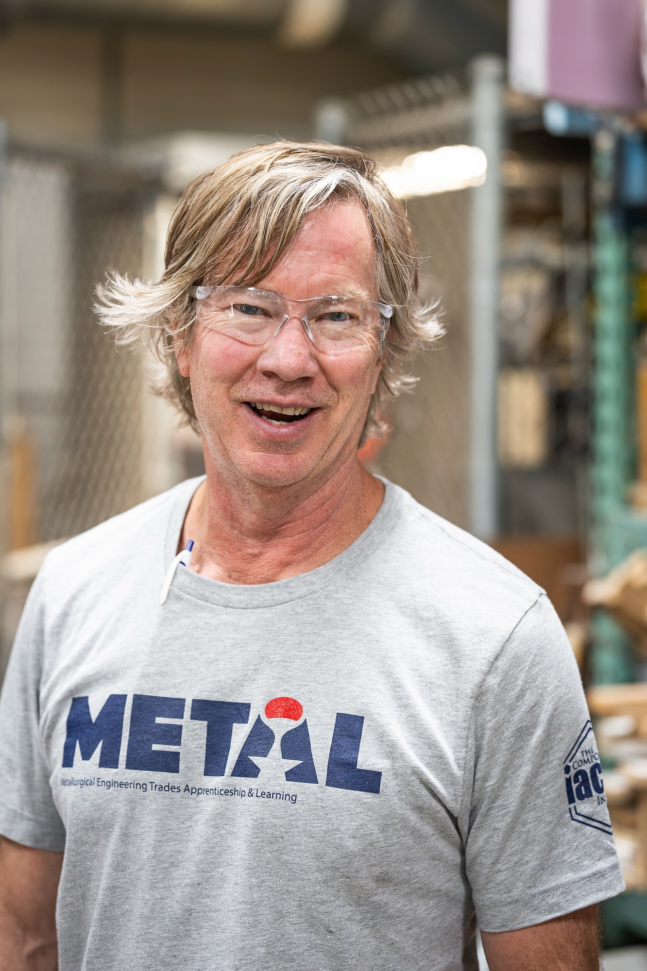 Wagner wears a grey tee shirt with the words METAL across the chest.