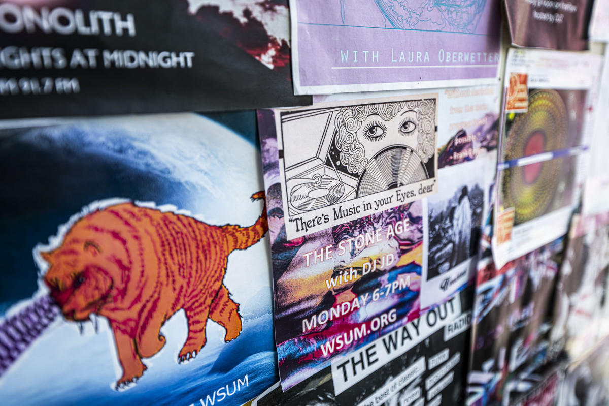 Colorful hand drawn posters on the wall of the WSUM studio