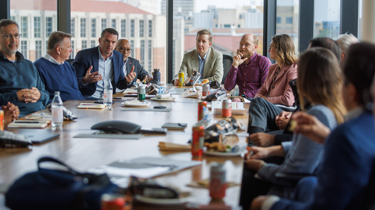 UW–Madison leaders join Dario Gil, under secretary for science at the U.S. Department of Energy, around a conference table at the Wisconsin Energy Institute.